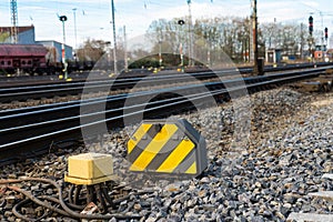 Automatic black yellow switch on railroad. Close up.