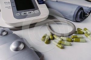 Automatic blood pressure meter and pills.