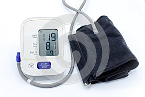 Automatic Blood pressure meter and Velcro cuff showing a normal healthy range of blood pressure with systolic 119 and diastolic 81 photo