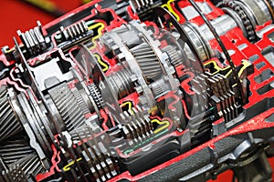 Automatic car transmission cutaway presented on a exhibition stand