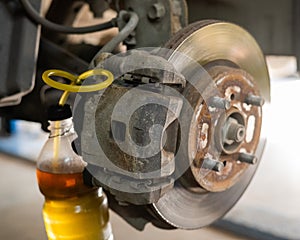 Automatic change of brake fluid in a car service.