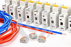 Automatic circuit breakers, on a white background. Electrical equipment. Accessories for electrical protection and control