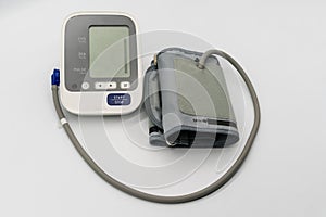 Automatic digital blood pressure monitor on white