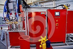 Automatic dosing, mixing and pouring unit for hot curing three-component polyurethane elastomers