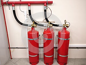 Automatic fire extinguishing system in the workplace. The security of your premises from conflagration. Red cylinders with