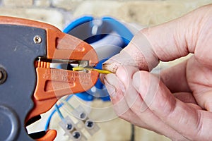 Automatic gauged wire stripper to cut, strip, and remove insulation.