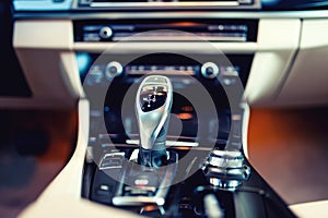 Automatic gear shifter in a, modern car. Car interior details