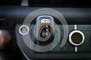 Automatic gear stick inside modern sport car. Luxury and expensive concept