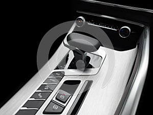 Automatic gear stick of a modern car. Modern car interior details. Close up view. Car inside. Automatic transmission lever shift.