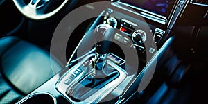Automatic gear stick of a modern car. Modern car interior details. Close up view. Car detailing. Automatic transmission