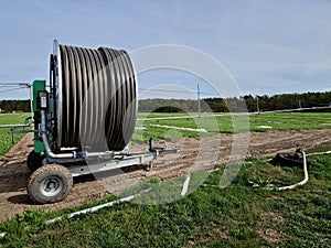 automatic irrigation is used for field vegetable operations. hose reel