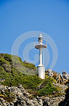 Automatic lighthouse on the rocks