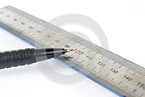 Automatic pencil and metal line on a white background