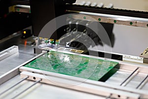 Automatic pick and place machine for PCB assembly