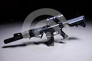 Automatic rifle with silencer and optical scope