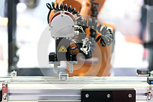 Automatic robot arm with imaging sensor in assembly line working