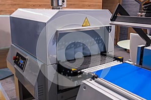 Automatic shrinking packaging machine at plastic exhibition