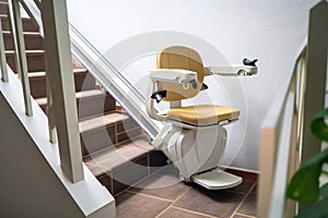 Automatic stair lift on staircase taking people