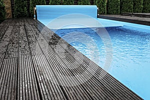 Automatic swimming pool covering system, home and cottage equipment