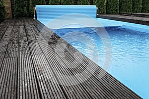 Automatic swimming pool covering system, home and cottage equipment photo