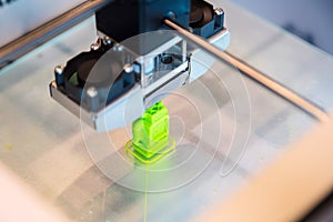 Automatic three dimensional 3d printer performs product creation. Modern 3D printing or additive manufacturing and robotic