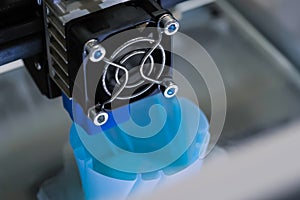 Automatic three dimensional printer machine printing plastic 3D model: close up