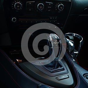 Automatic transmission in car. Interior detail.