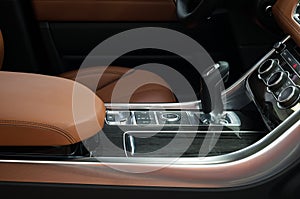 Automatic transmission gear shift. Modern car inside.