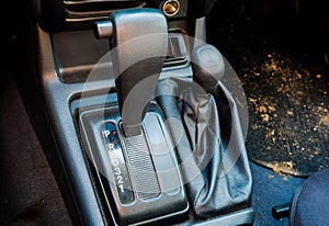 Automatic transmission gearbox and low and high 4 x 4 switch handle