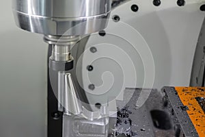 Automatic turning milling machine cutting metal workpiece at factory