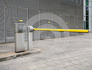 Automatic yellow barrier at the entrance of a business park in Bucharest