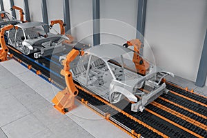 Automation automobile factory concept with robot assembly line in car factory