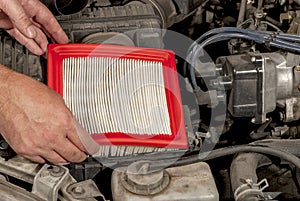 Automobile air filter replacement by machanic