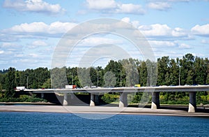 Automobile bridge across the Columbia River by flowing traffic i