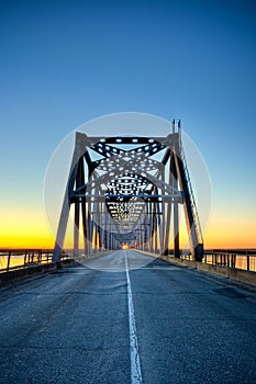 Automobile bridge on sunrise