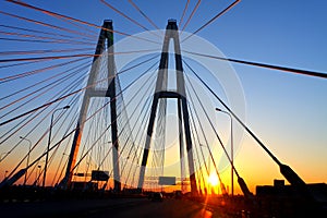 Automobile bridge at sunset