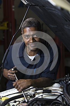 Automobile mechanic smiling