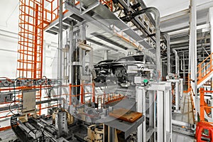 Automobile production line. Welding car body. Modern car assembly plant. Auto industry. Interior of a high-tech factory