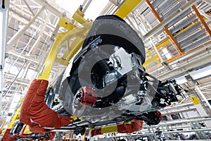 Automobile production line. Welding car body. Modern car assembly plant. Auto industry. Interior of a high-tech factory