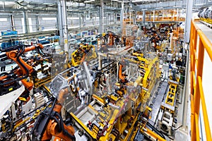 Automobile production line. Welding car body. Modern car assembly plant. Top view