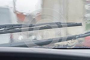 Automobile windshield wipers in the rain