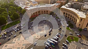Automobiles driving on Republic square in Yerevan, aerial view of main street