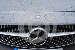 Automotive: Close up of the grille / badge on a Mercedes sports car. 1