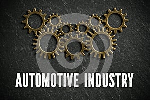 AUTOMOTIVE INDUSTRY beneath meshing copper gears