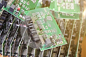 Automotive Printed Circuit Boards with Surface Mounted Components. PCb Lying On Top of Batch. Shallow DOF. Lens FlareAdded