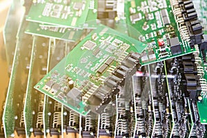 Automotive Printed Circuit Boards with Surface Mounted Components. PCb Lying On Top of Batch. Shallow DOF. Lens FlareAdded