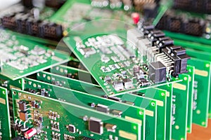 Automotive Printed Circuit Boards with Surface Mounted Components with PCBs On Top of Boards