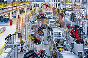 Automotive production line. Welding car body. Modern car Assembly plant