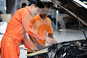 Automotive service mechanic inspect and diagnose car engine. Oxus