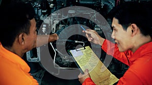 Automotive service mechanic inspect and diagnose car engine. Pano Oxus